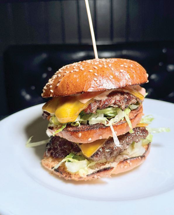 Smoked Thousand Island dressing is the secret sauce to Village Whiskey's VW Mac.