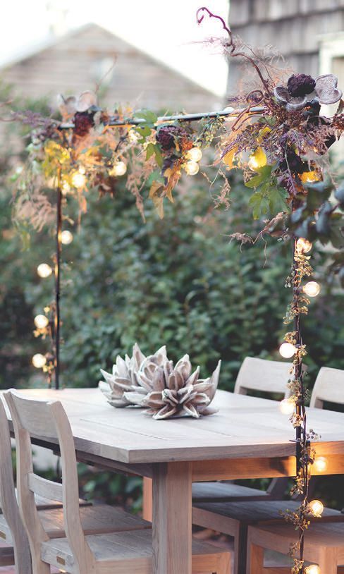 Over-the-Top Rod: "This decorative iron rod is perfect for draping string lights, florals or greenery for an effortlessly enchanting atmosphere and enhancing any table scape." Shopterrain.com