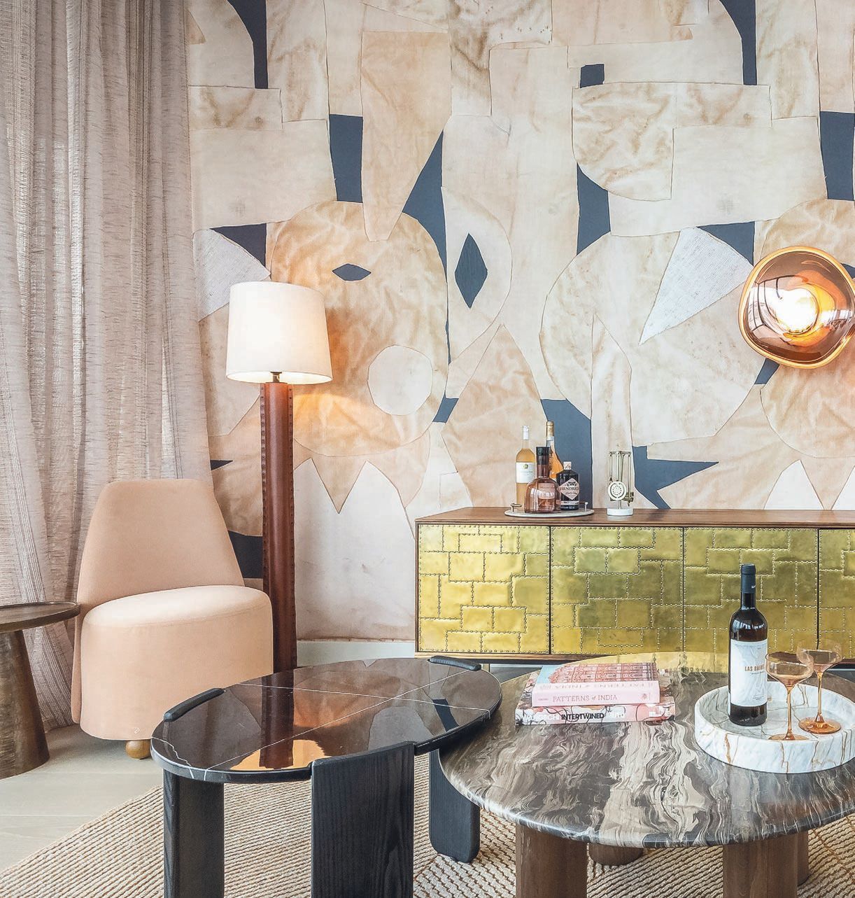 IMG used a dynamic mix of furniture, wallcoverings and lighting, including Tom Dixonâs sconces, to form an expressive look and feel inside a penthouse at Five Park that speaks to the residential propertyâs vibrant amenities. PHOTO COURTESY OF INTERIOR MARKETING GROUP (IMG)