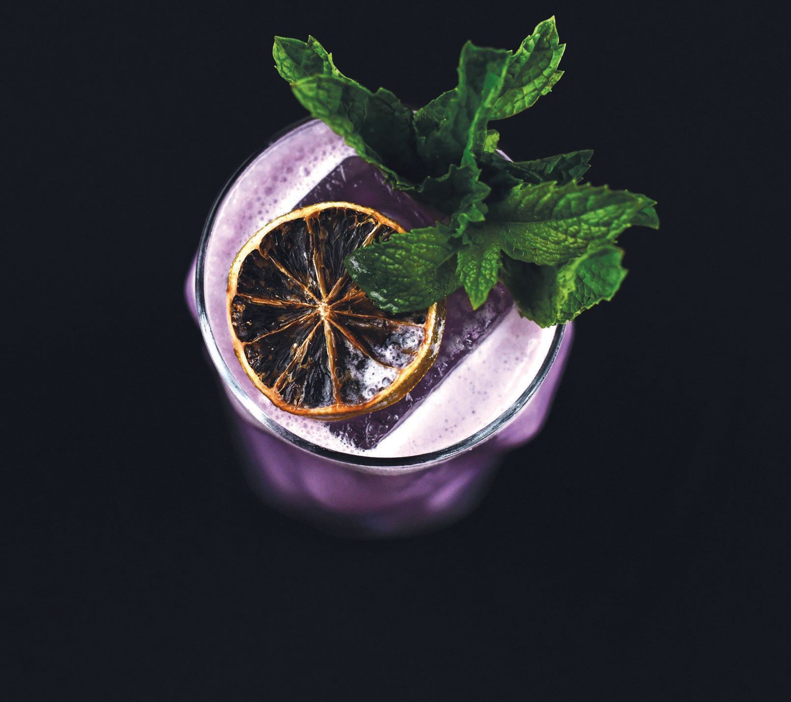 The Thrilla in Manila cocktail with Mezcal, rum, banana, ube, coconut, pineapple and lime. PHOTO COURTESY OF LA CUEVA