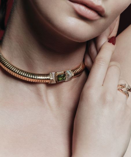 Bvlgari Tubogas 18K gold necklace with four fancy mother-of-pearl and one emerald tourmaline; Serpenti Seduttori 18K rose gold ring set with rubellite eyes and pavÃ© diamonds, bulgari.com. Photographed by JONG HYUP