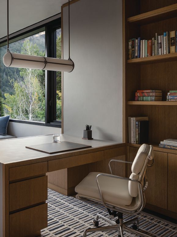 A home office provides plenty of quiet, gorgeous space for the homeowners. photographed by ERIC PETSCHEK