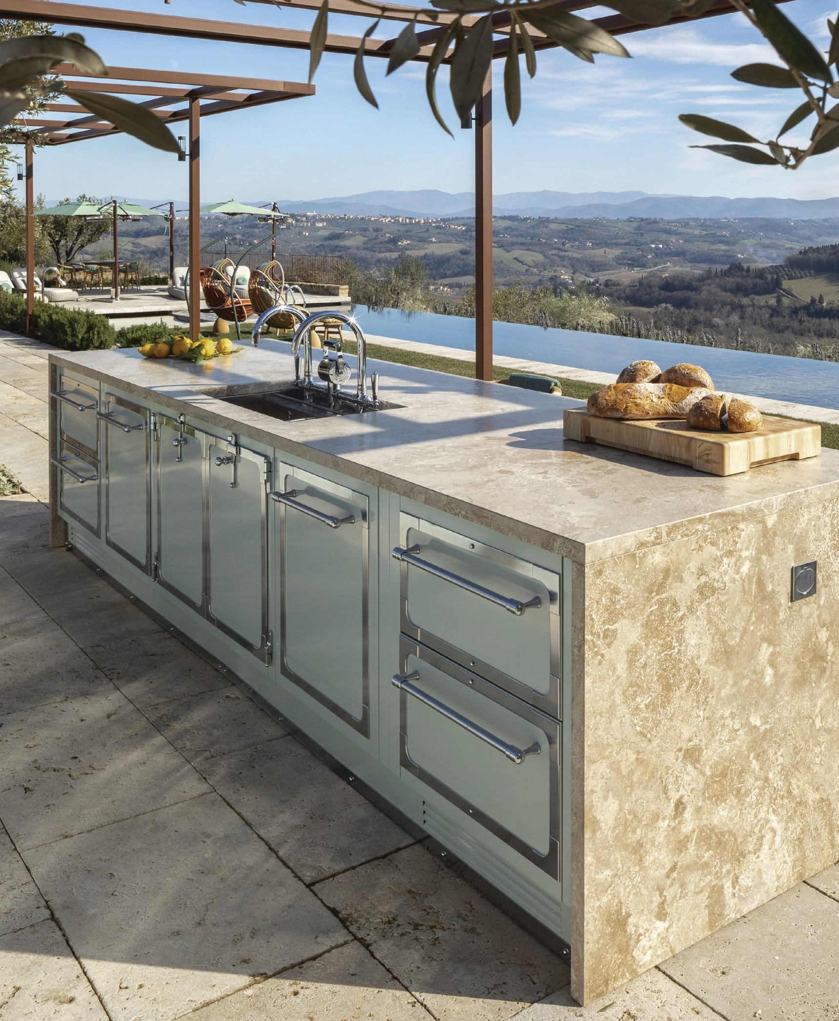 BEST OUTDOOR KITCHEN Officine Gullo Outdoor Kitchen Officine Gullo brings its professional-grade pedigree outsideâpairing unmistakable style with modular, fully customizable performance. Designed as the epicenter of outdoor living, the system is built from AISI 316 stainless steel for exceptional corrosion resistance and longevity, with flexible components that allow for dedicated zonesâgrill, pizza oven, refrigeration, washing, prep and more. At its heart: OG Professional Grills, with accessory-driven versatility that supports a wide range of cooking methods beyond traditional grilling. Itâs a true outdoor culinary atelier. officinegullo.com