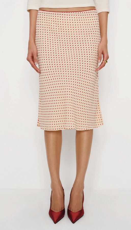 Reformation's Layla knee-length skirt in Marilyn dot PHOTO COURTESY OF BRANDS
