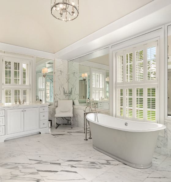 The homeâs primary bathroom. DRONE HOME MEDIA