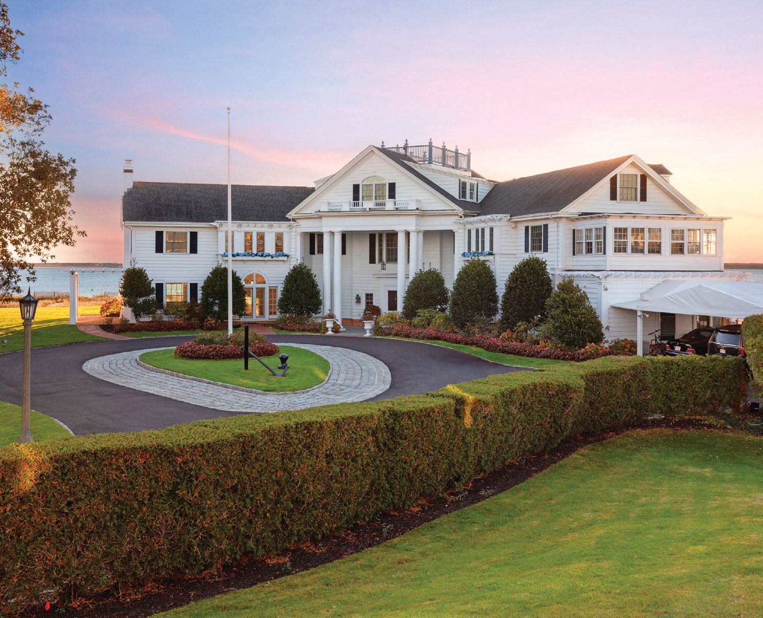 This Cape Cod waterfront estate is often mistaken for its neighbor, the iconic Kennedy compound. PHOTO BY TRACY SHEEHAN
