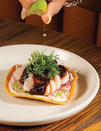 Indulge in AmÃ¡âs callo de hacha tostada with scallops, avocado, pickled red onion, tonnato and salsa morita PHOTO: BY MIKE PRINCE