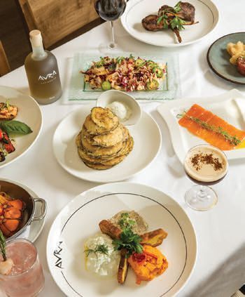 A spread of dishes including the Avra chips.PHOTO BY MICHAEL BLANCHARD