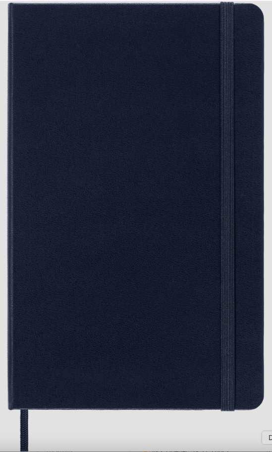 Closed navy blue notebook with elastic band and ribbon bookmark on a white background.