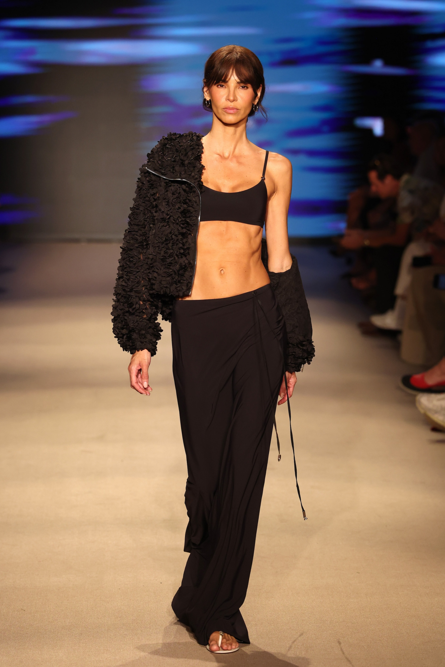 SHAN unveils its Cruise 2027 one look which was an sophisticated black coverup showcasing Coastal elegance