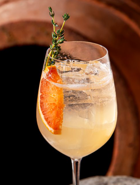 A drink from estiatorio Milos named Aegean that highlights the regional expression with Greek citrus and herbal aromatics