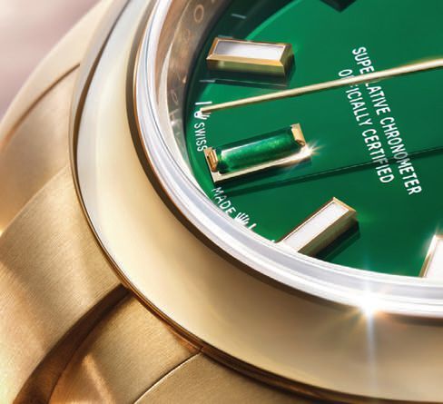 Rolex Oyster Perpetual 28 green stone lacquer dial and hour markers in 18K yellow gold at 3, 6 and 9 oâclock with heliotrope; PHOTO COURTESY OF BRAND