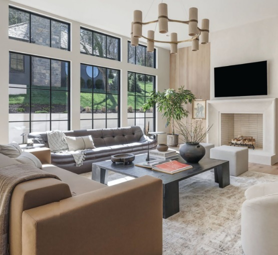 The living room is designed in equal parts for relaxing and entertaining, flowing seamlessly from the gorgeous chefâs kitchen. PHOTO BY HOME PIX MEDIA, COURTESY OF THE ERIN KRUEGER TEAM