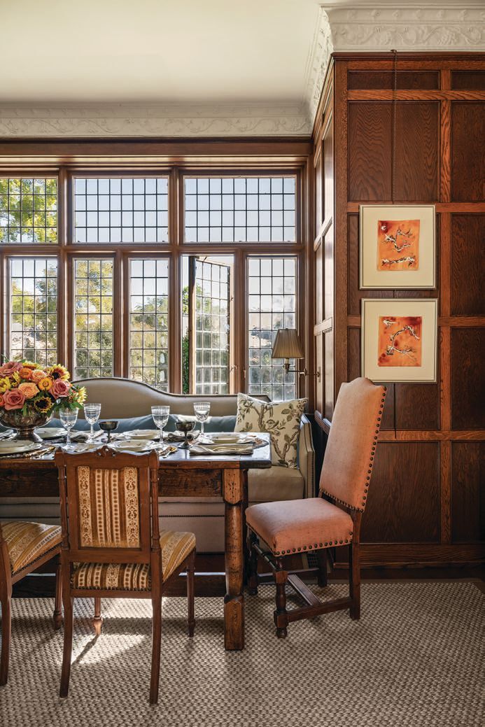 Vintage dining chairs were recovered and existing art pieces were rearranged and mixed with new pieces Stein added to her parentsâ collection. photography by Tori Sikkema styling by Mark Thompson