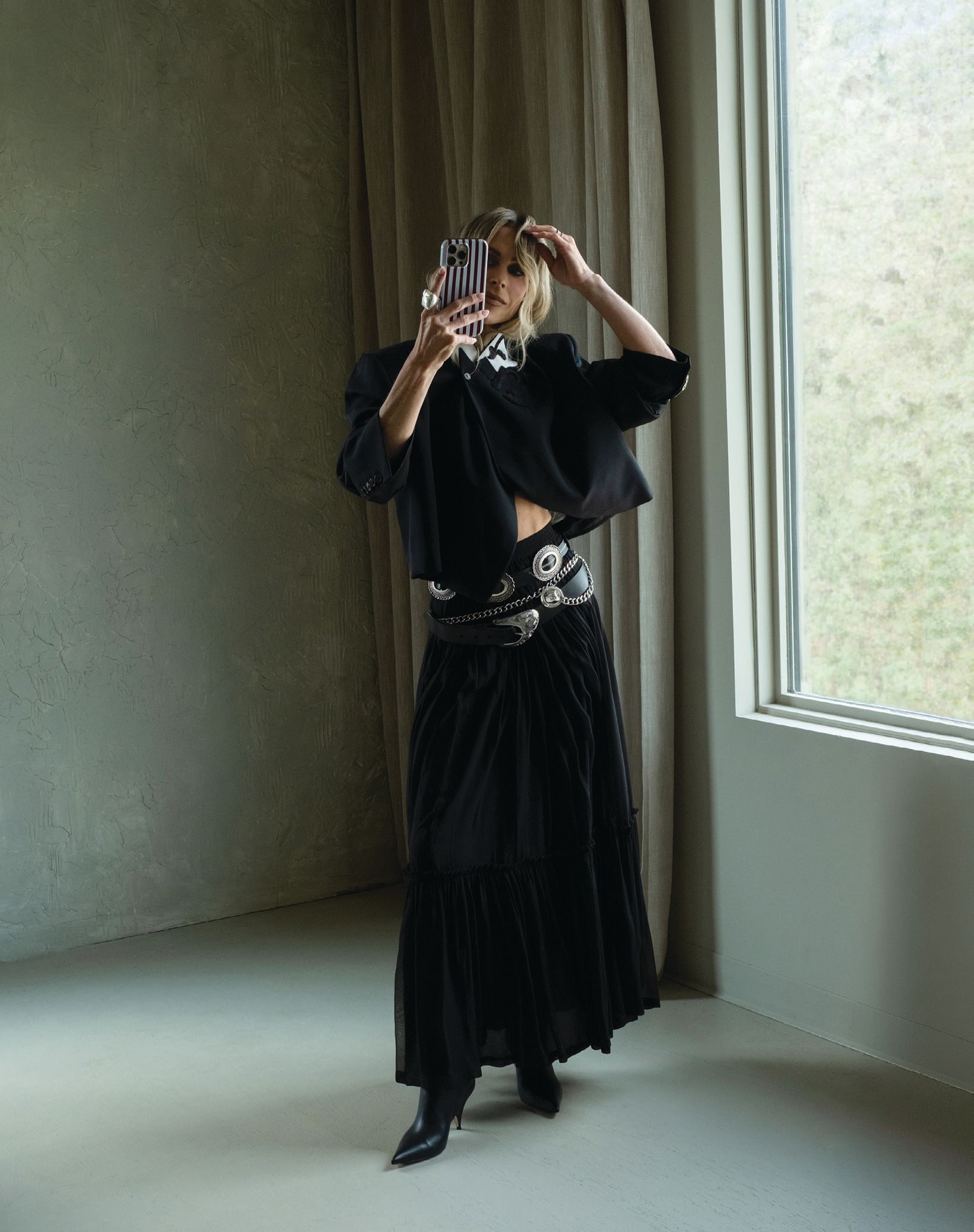 Saint Laurent skirt and Gia Rossi booties from Kirna Zabête, kirnazabete.com; Dries Van Noten jacket, Maryâs own; belts, vintage and Maryâs own (top) photography by GRANT LEGAN