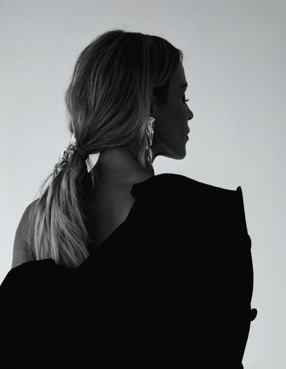 DOLCE&GABBANA blazer, dolcegabbana.com; Alexis Bittar Cascade earrings and brooch, alexisbittar.com; ALAÃA ready-to-wear Violet Bubble dress, maison-alaia.com, Alexis Bittar Lucite and silver Saucer bangle bracelets and Puffy Lucite bangle bracelet in dusty rose, alexisbittar.com. photography by GRANT LEGAN