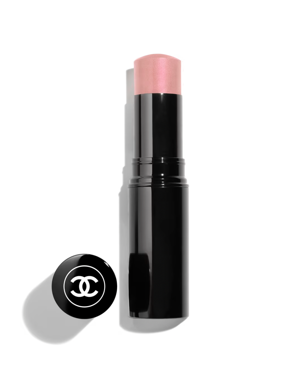 Chanel pink lipstick stick with black casing and cap featuring Chanel logo.