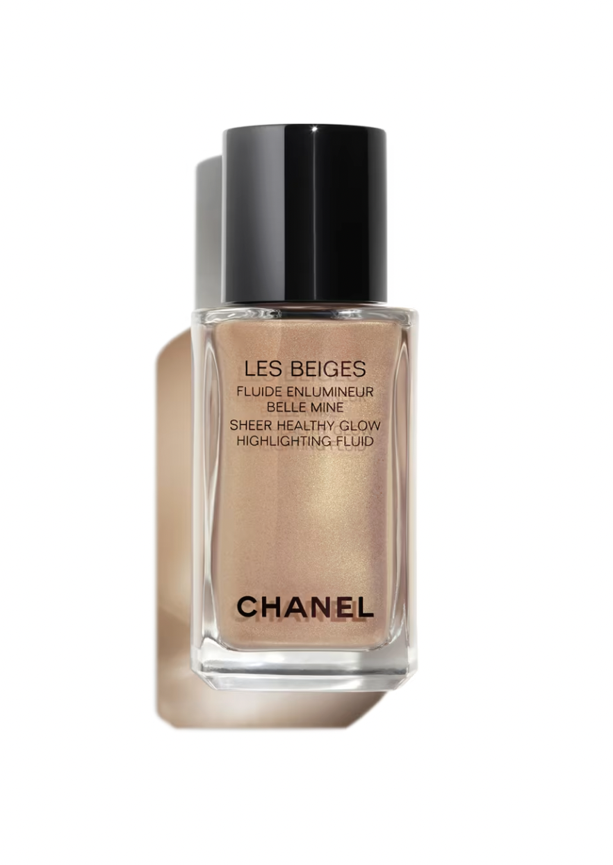 Bottle of Chanel Les Beiges Sheer Healthy Glow Highlighting Fluid with black cap on white background.