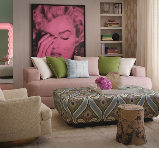 In the upstairs sitting room, Martyn Lawrence Bullard Atelier seating pairs with Palmier wallcovering in Blanche from his collection. The Shade Store drapery and Russell Young’s Marilyn Monroe diamond-dust artwork complete the layered space.