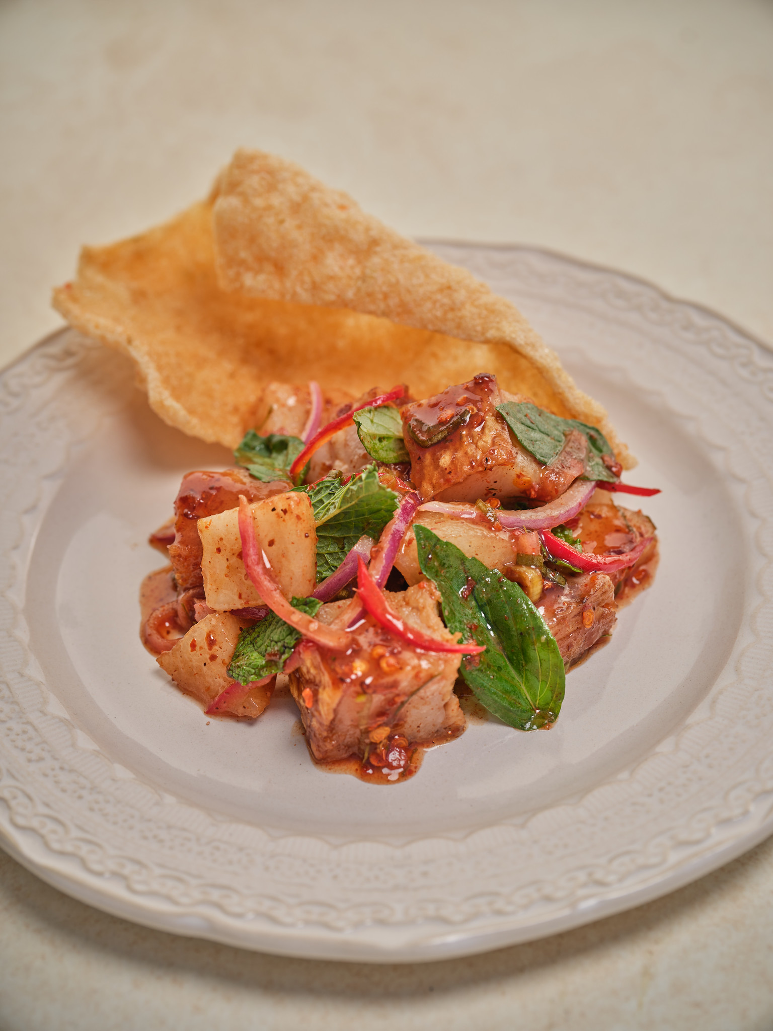 Crispy pork belly with Asian pears by chef Arnie Marcella of Michelin-starred Cobi’s.